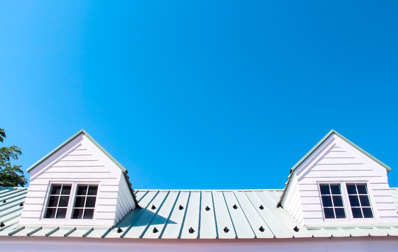 Pro Series snow guards on a standing-seam metal roof with dormers
